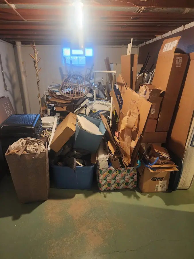 Roll-off dumpster container at job site for 8 Yard Dumpster Rental in Polk